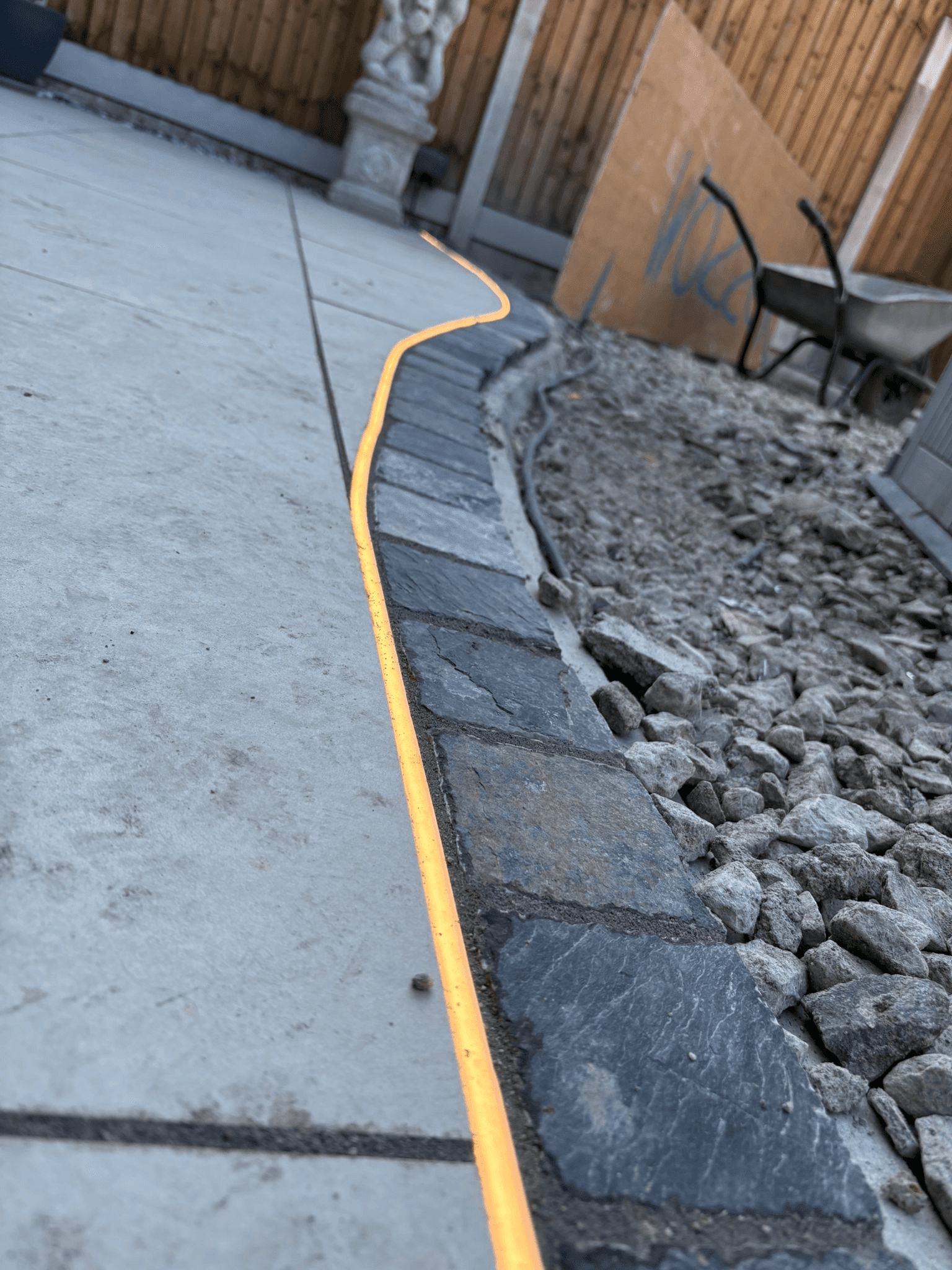 Outdoor cable run along patio edge